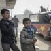 Bambini nel centro di Kobane assediata